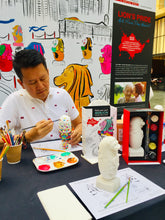 Load image into Gallery viewer, Unleash Your Creative Roar this National Day with the 'Lion's Pride - Paint Your Own Merlion' art workshops.